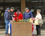 Post 370 members giving away poppies and collecting donations at Bryson's Grocery.